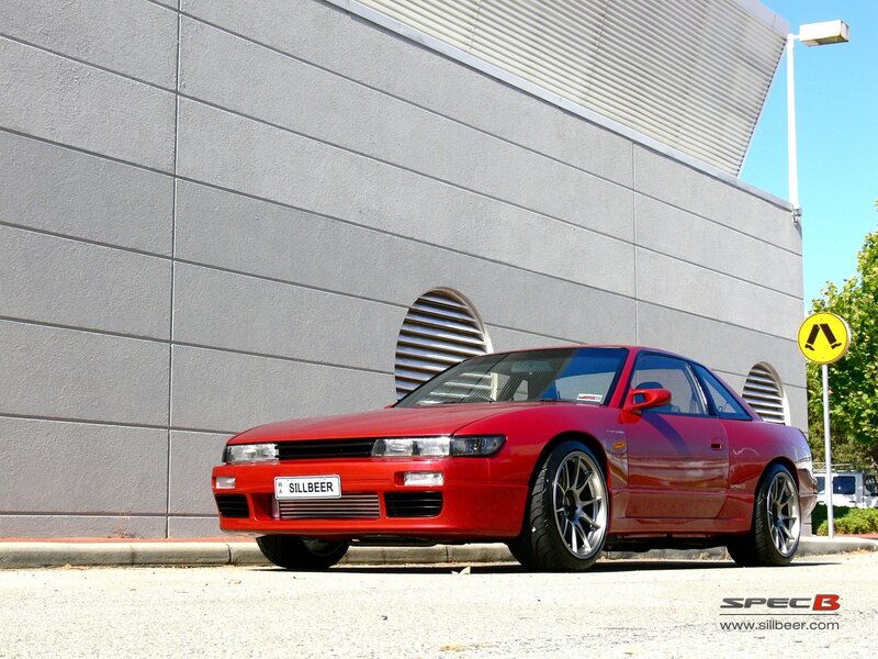 Red Coupe Car — Calm, Afternoon, Photograph, Building