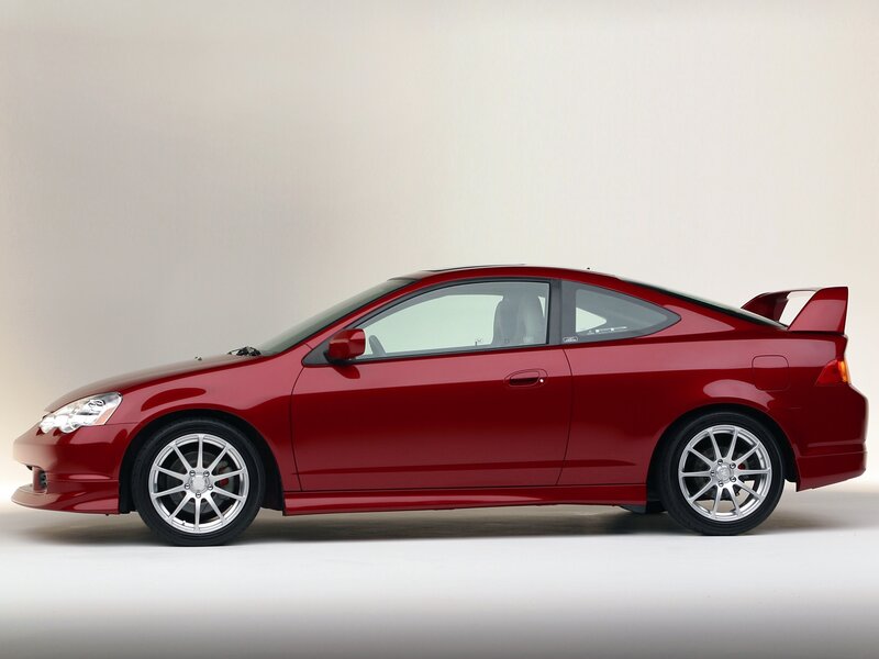 Red Coupe Car — Neutral, Photograph, Wheels