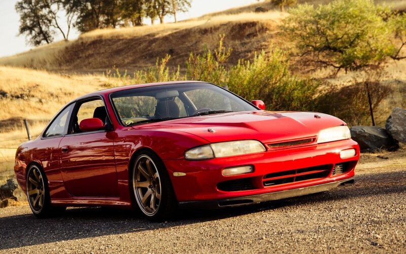 Red Coupe Car — Serene, Sunset