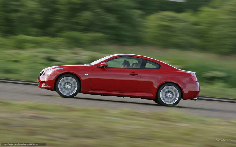 red coupe in motion