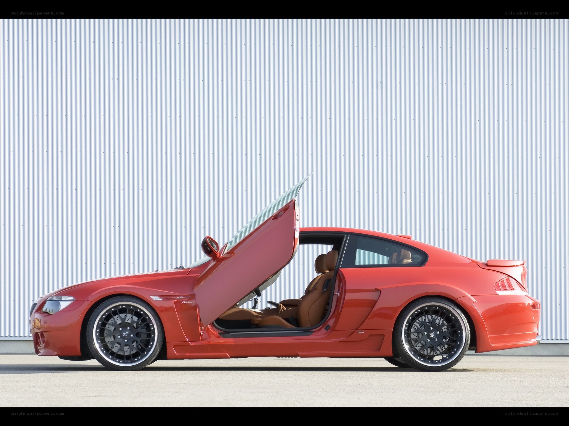 red coupe with gullwing door