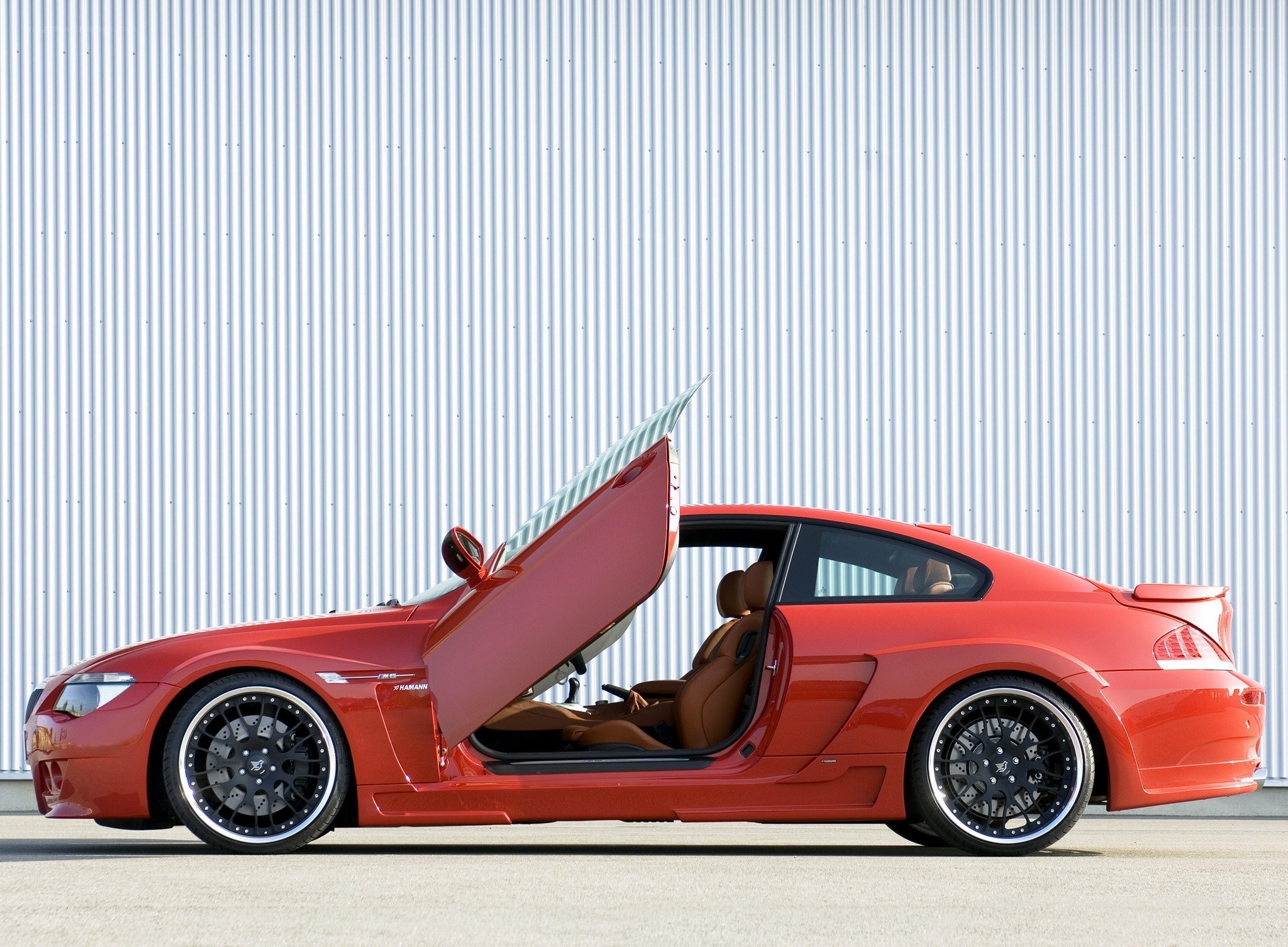 Red coupe with gullwing door