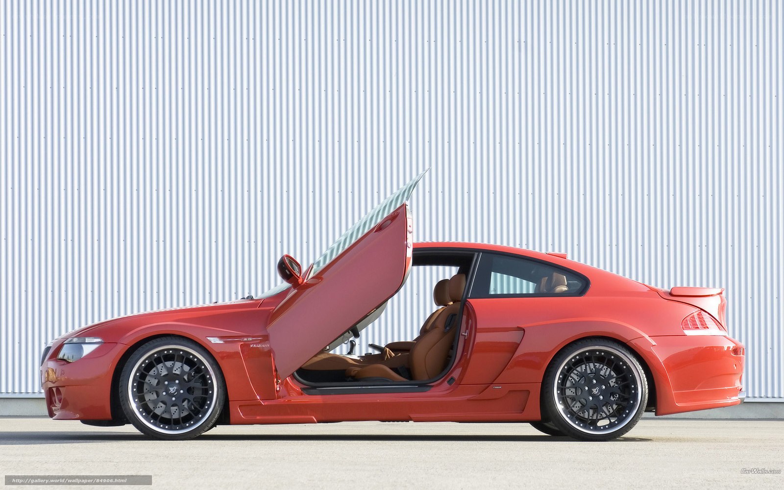 red coupe with gullwing door