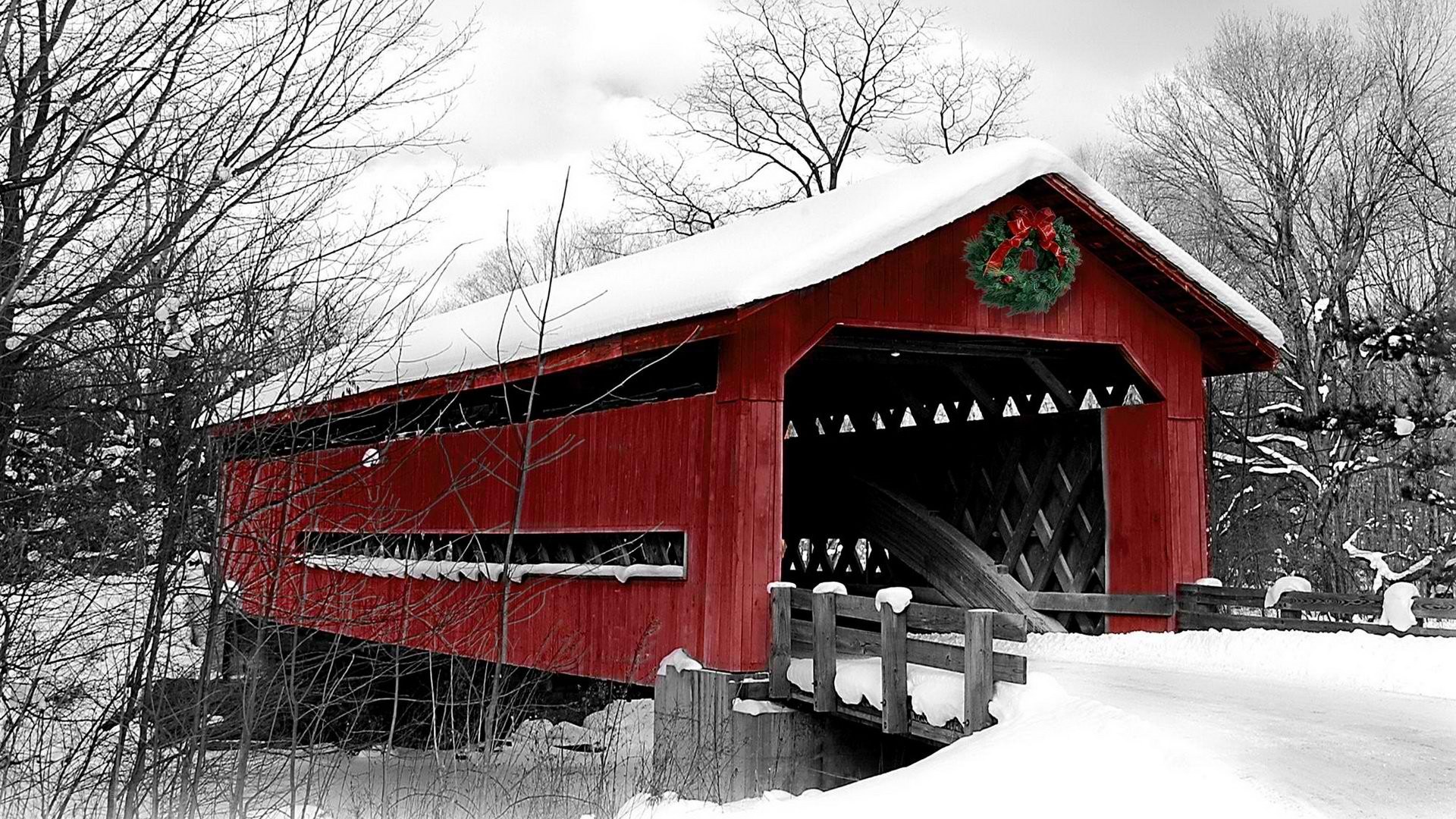Red covered bridge in winter