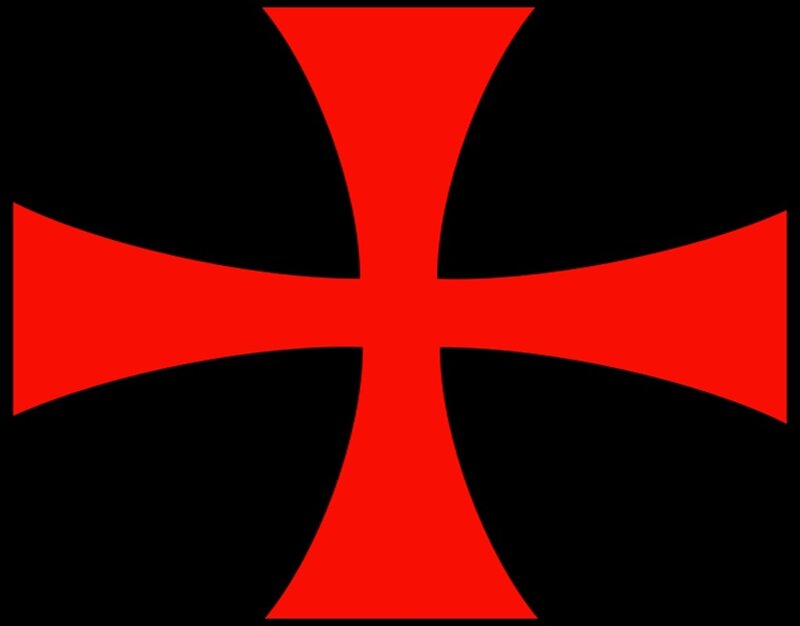 red cross on black background