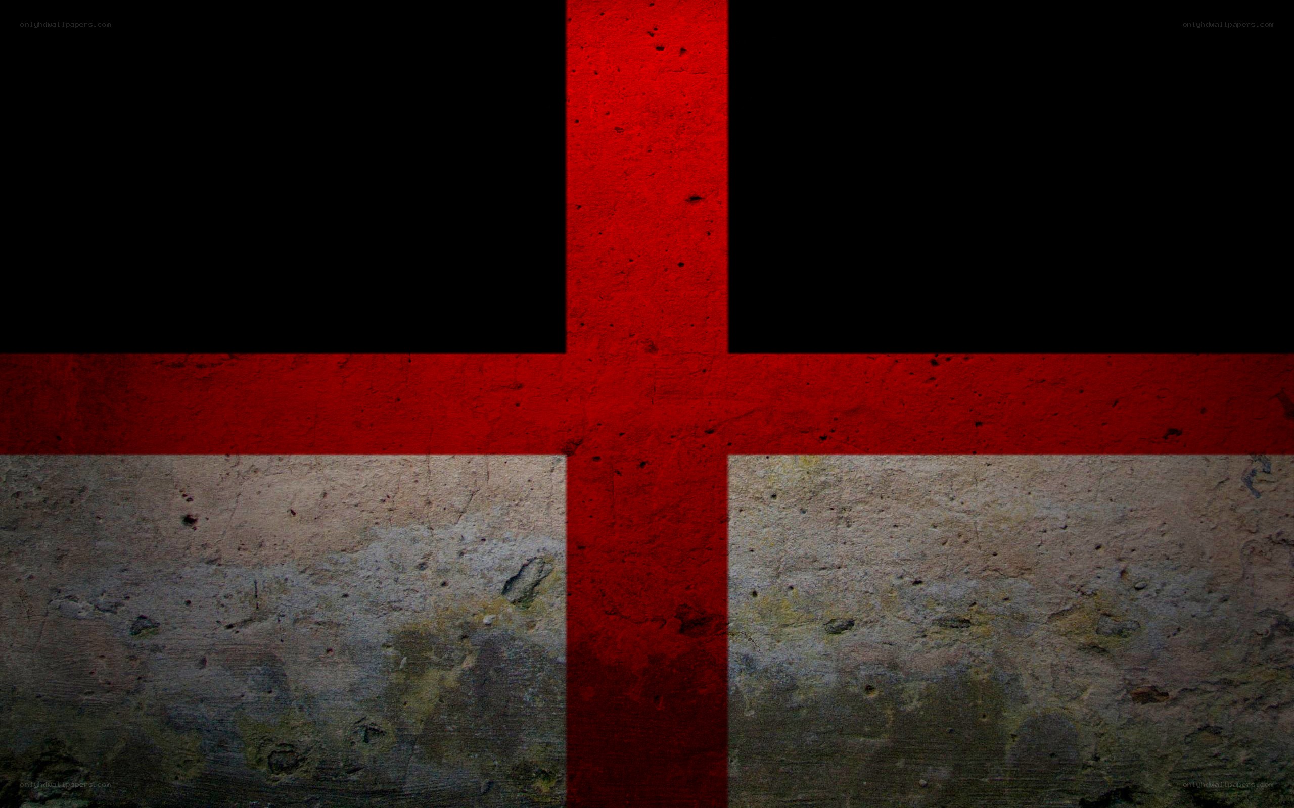 red cross on concrete wall