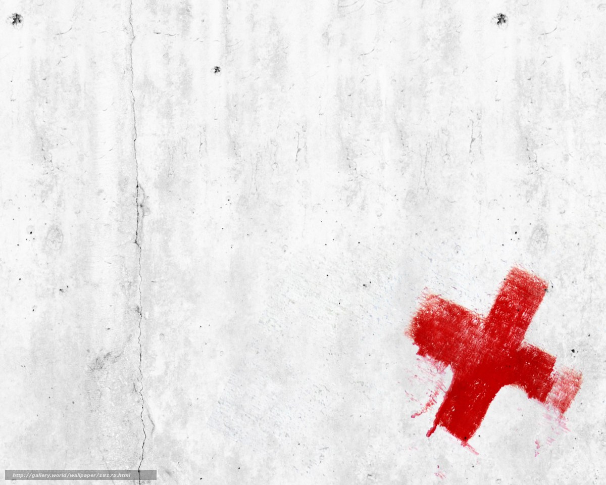 Red cross on concrete wall