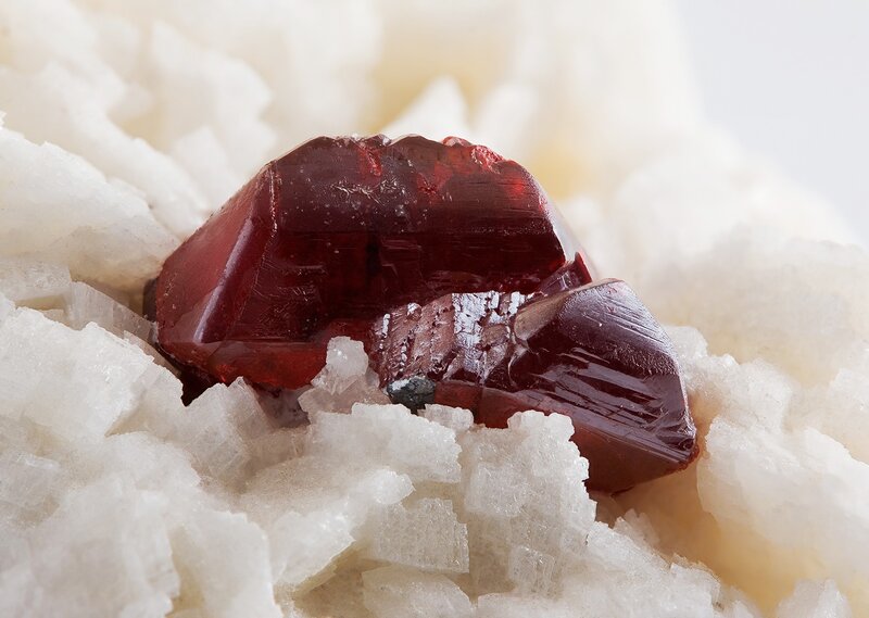 Red crystal on white matrix