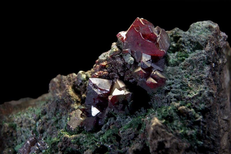 Red crystals on rock matrix