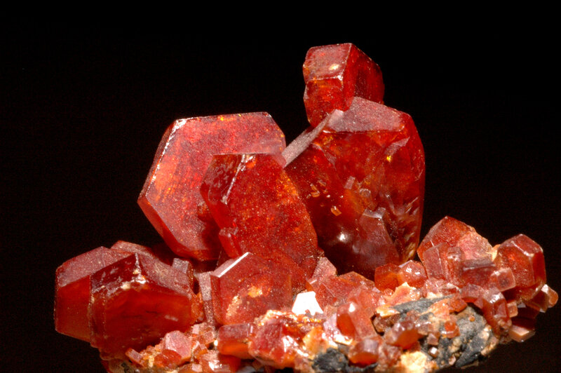 Red Crystals on Rock