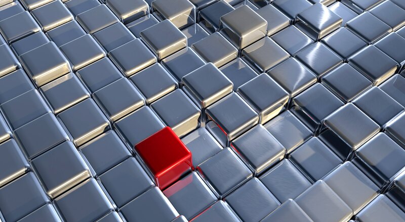 Red Cube on Metallic Grid