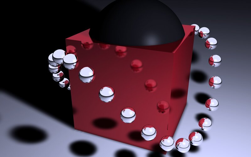 Red cube with reflective spheres