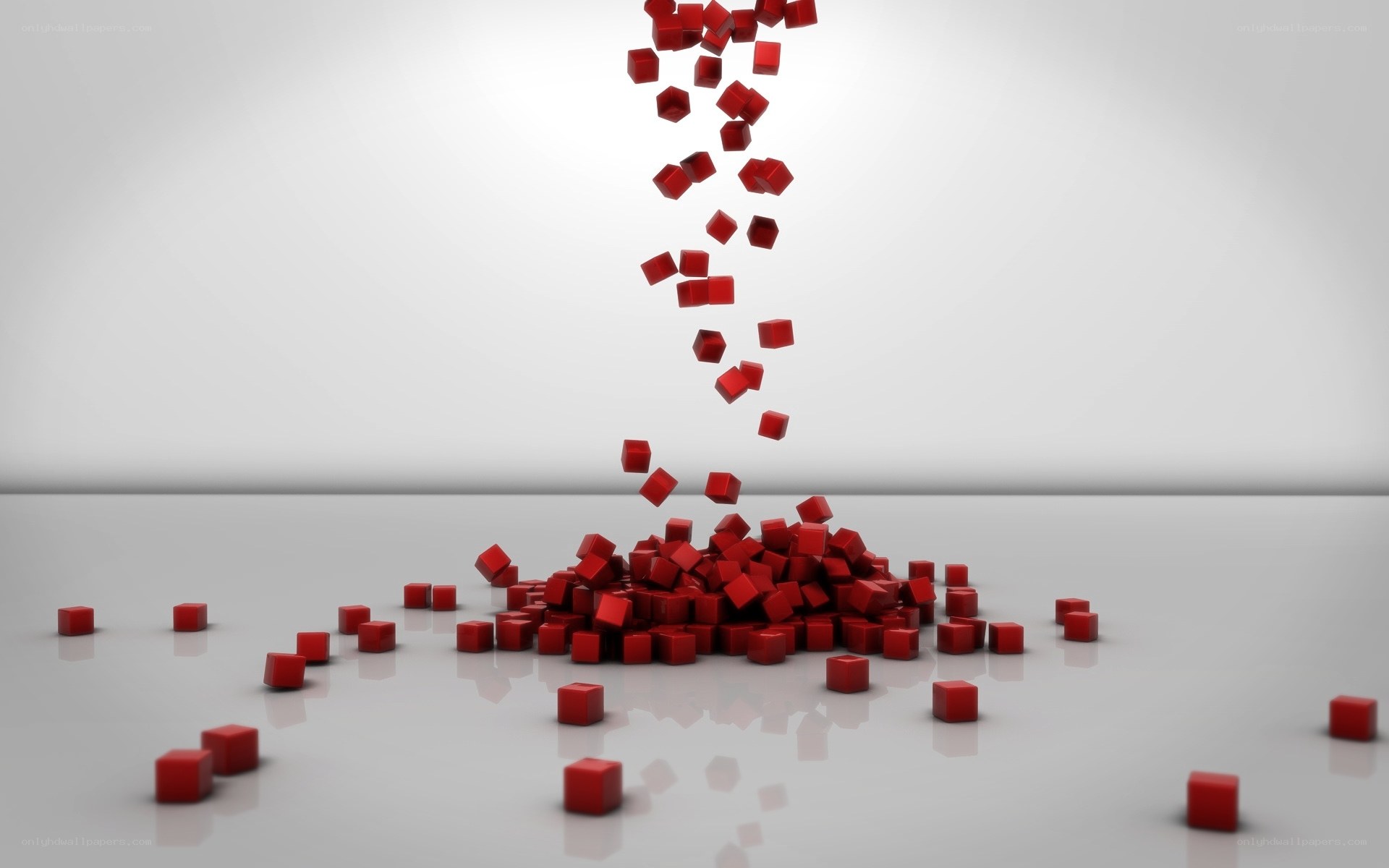 Red cubes falling on white surface