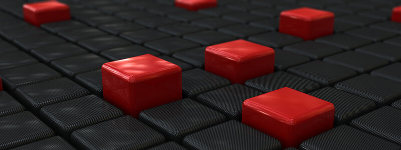 Red cubes on black grid