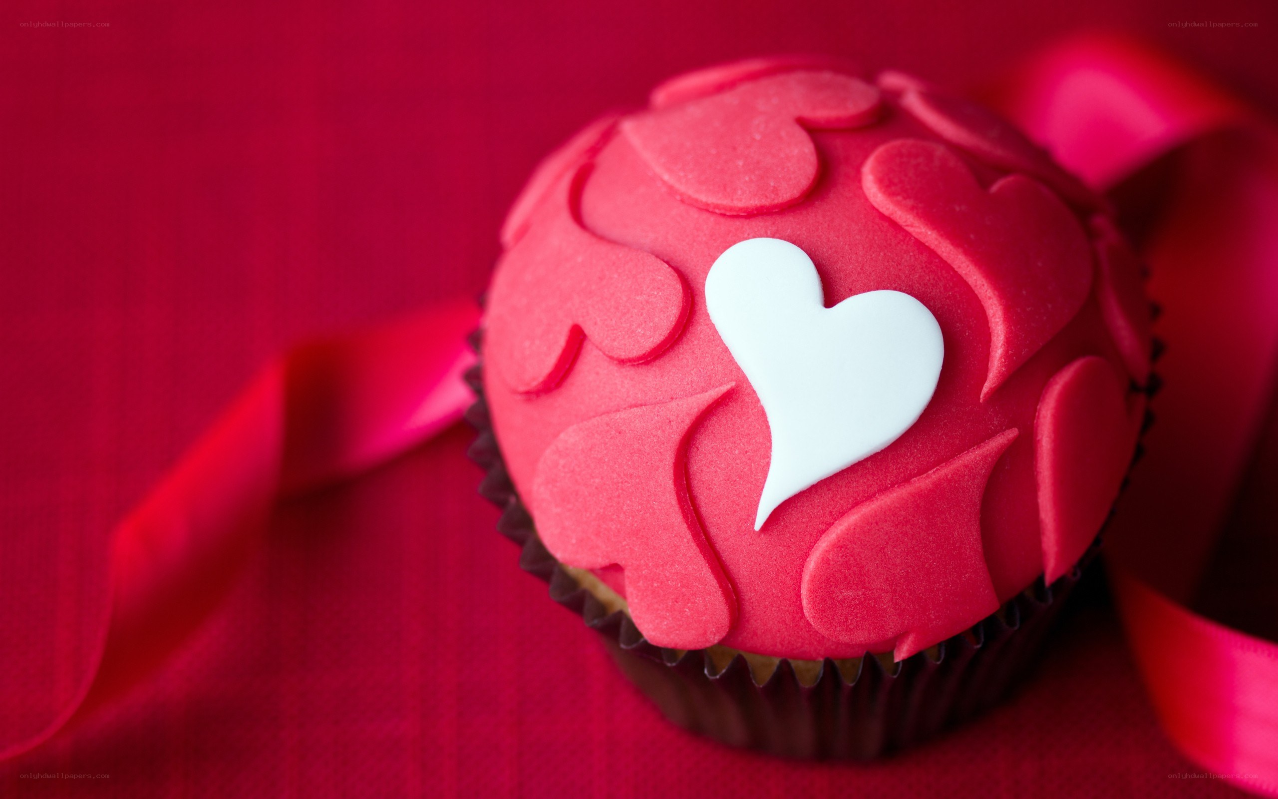 red cupcake with heart design
