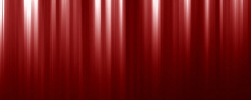 red curtain with light streaks