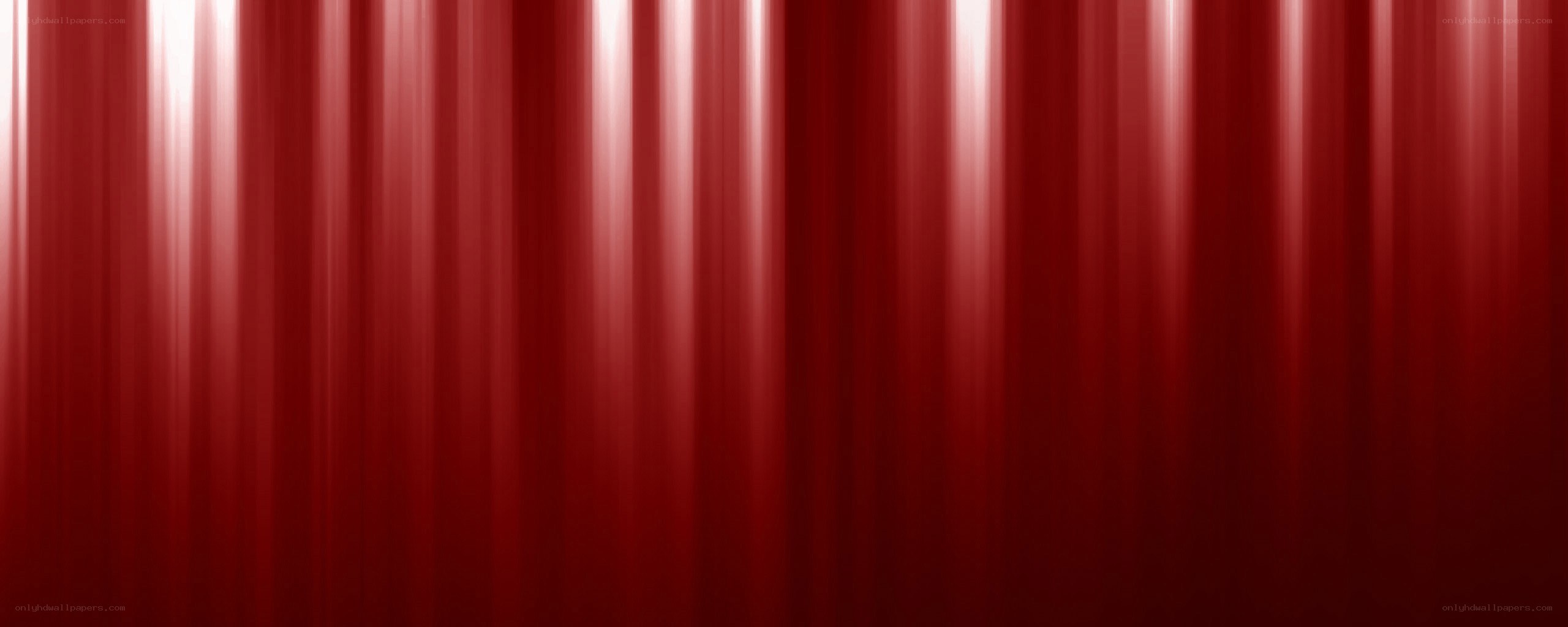 red curtain with light streaks