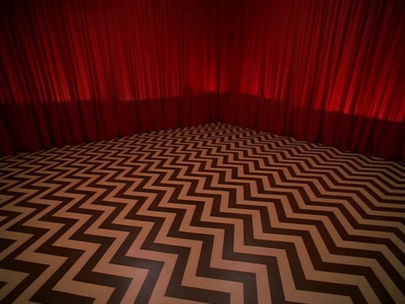 red curtain with zigzag floor