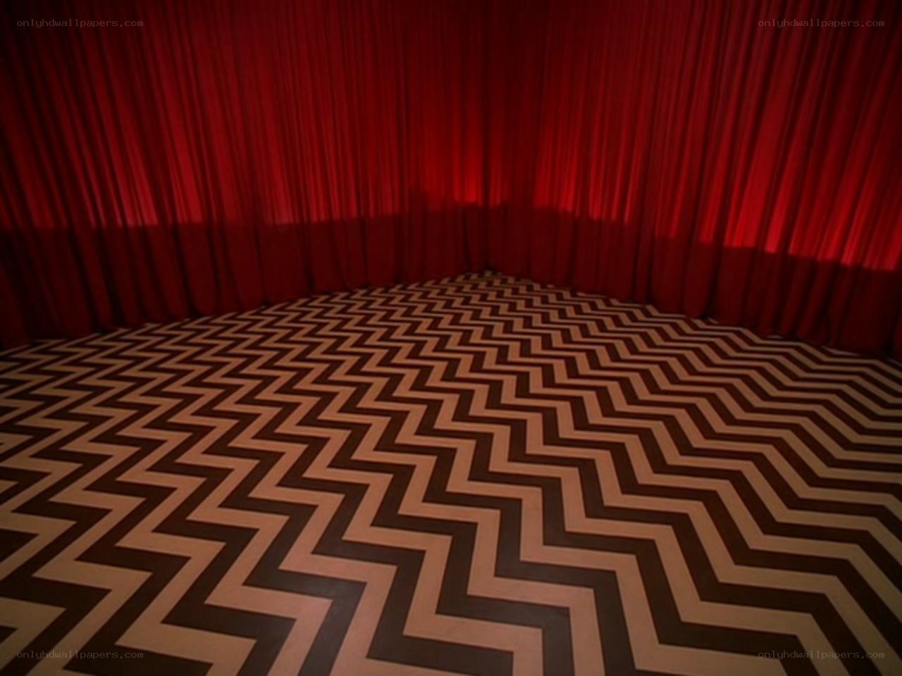 red curtain with zigzag floor