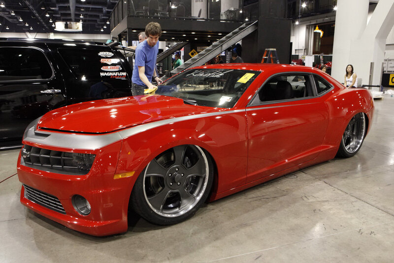 Red custom car at a show