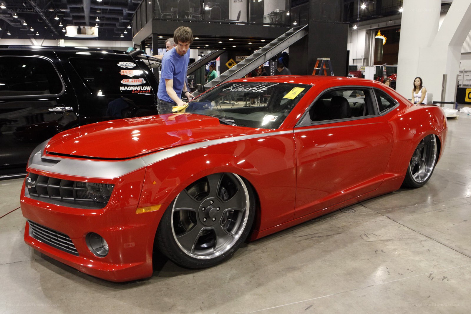 Red custom car at a show