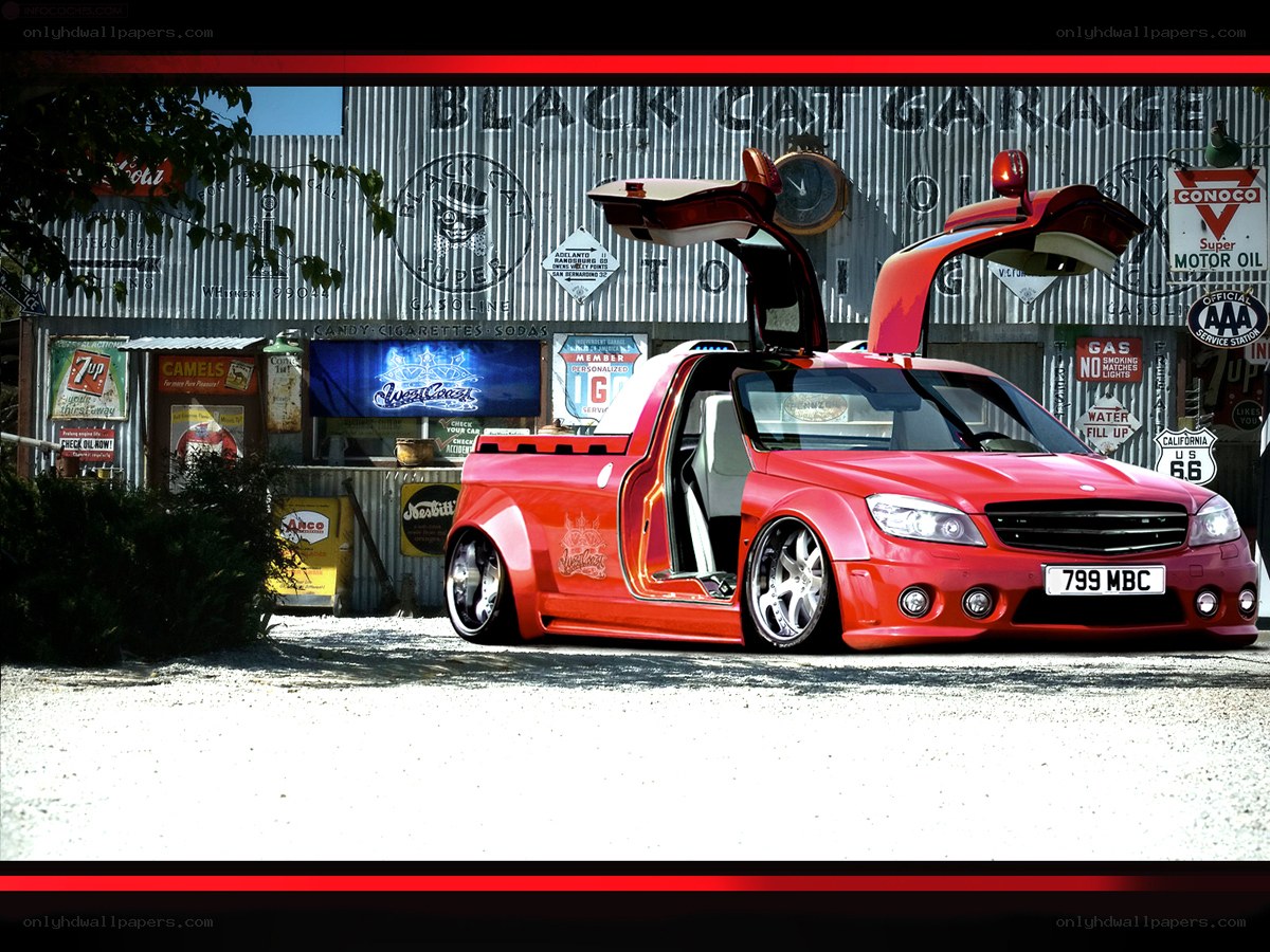 Red custom car at garage