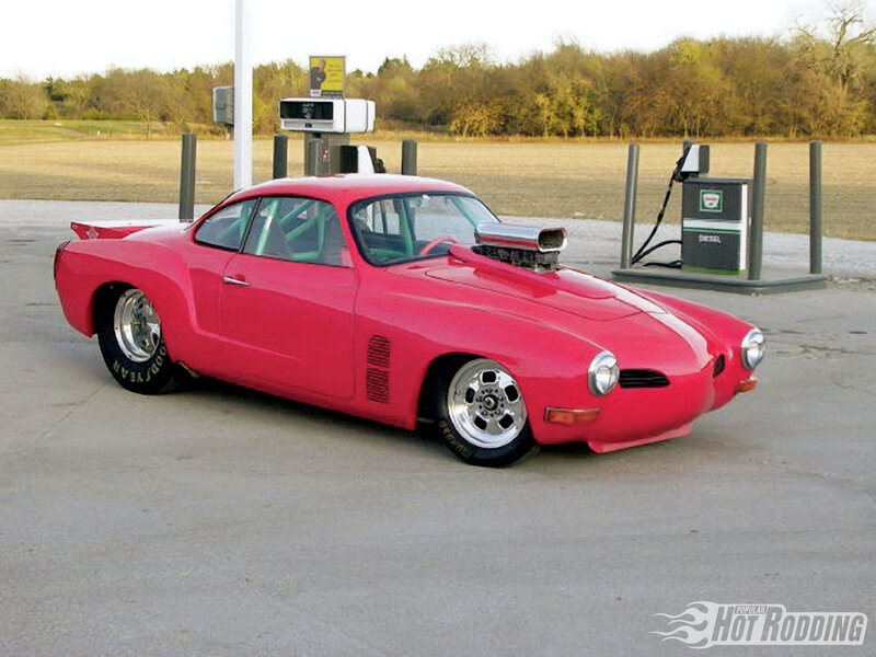 Red Custom Car — Calm, Afternoon, Photograph, Gas Pump