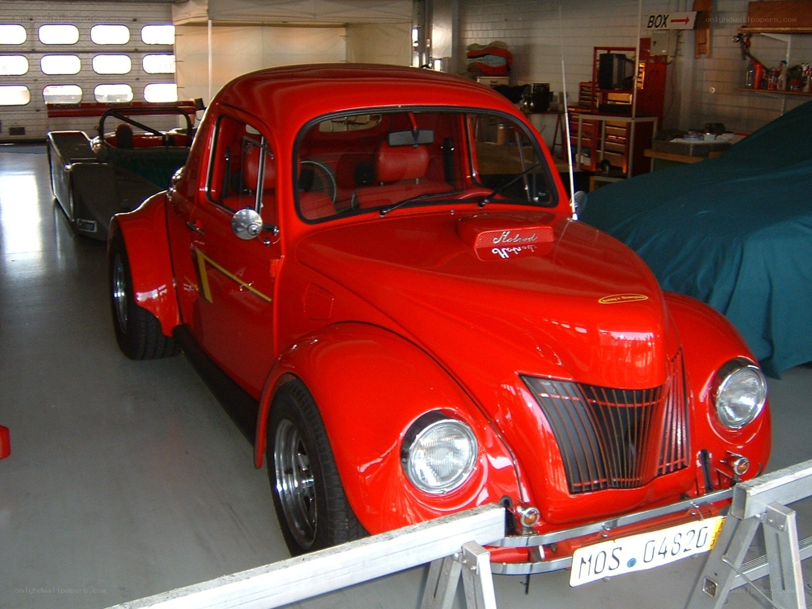 Red custom car in garage