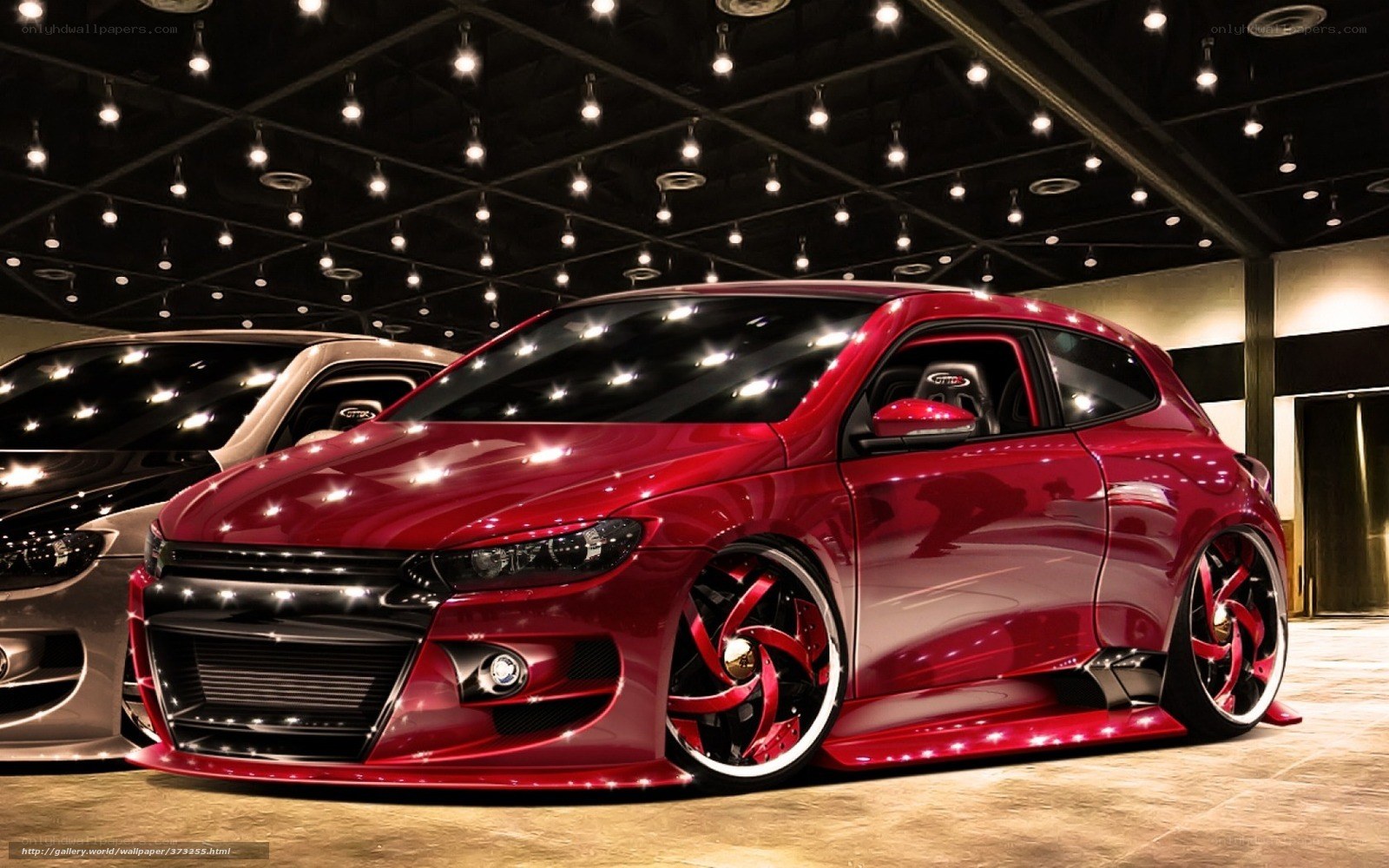 Red custom car in showroom