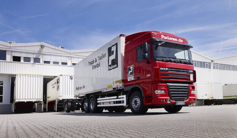 Red DAF truck with PacLease trailer