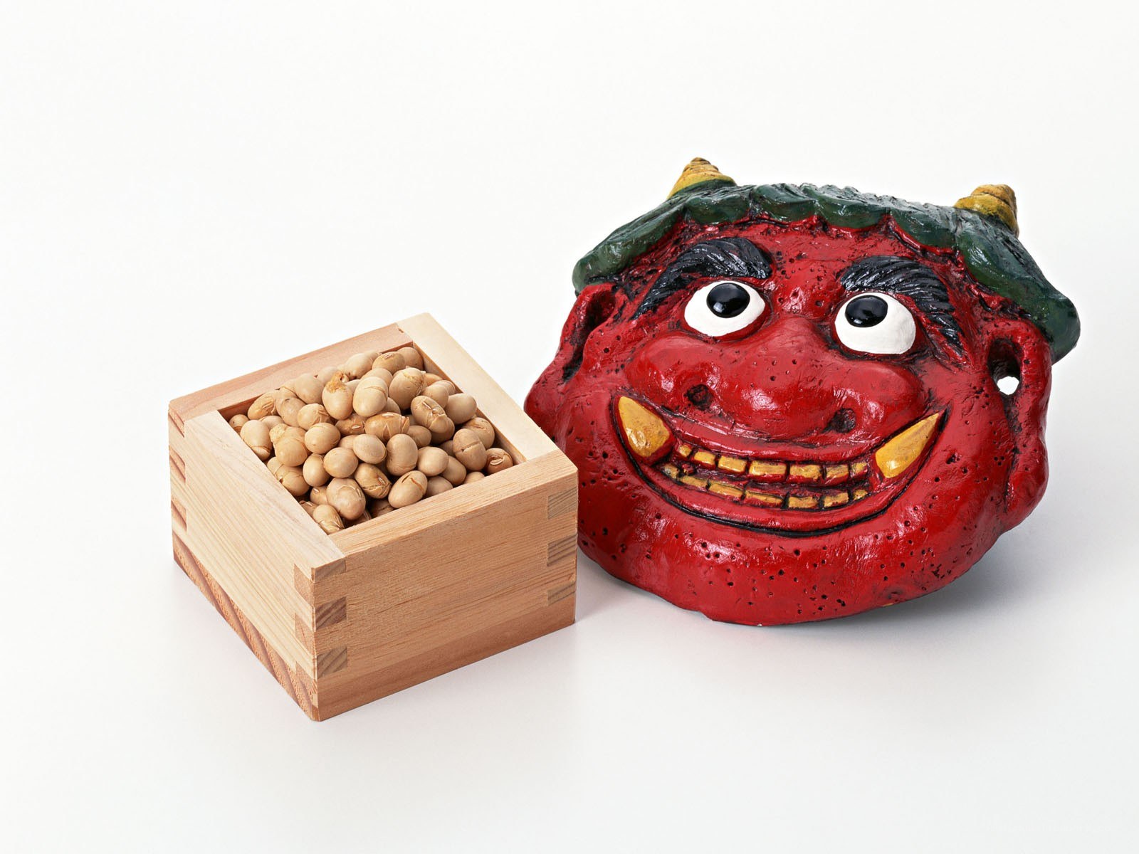 Red demon mask with soybeans