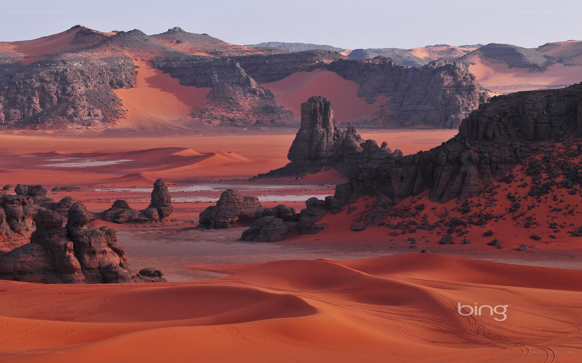 Red desert landscape with rock formations