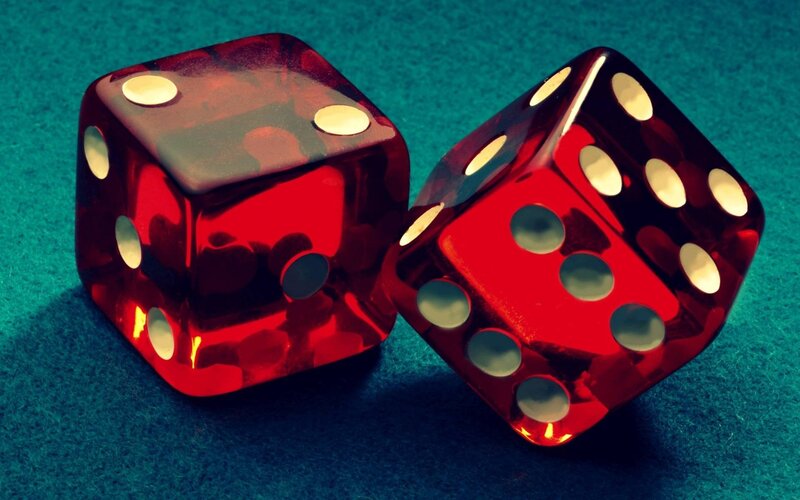 Red Dice on Green Surface — Dramatic, Photograph