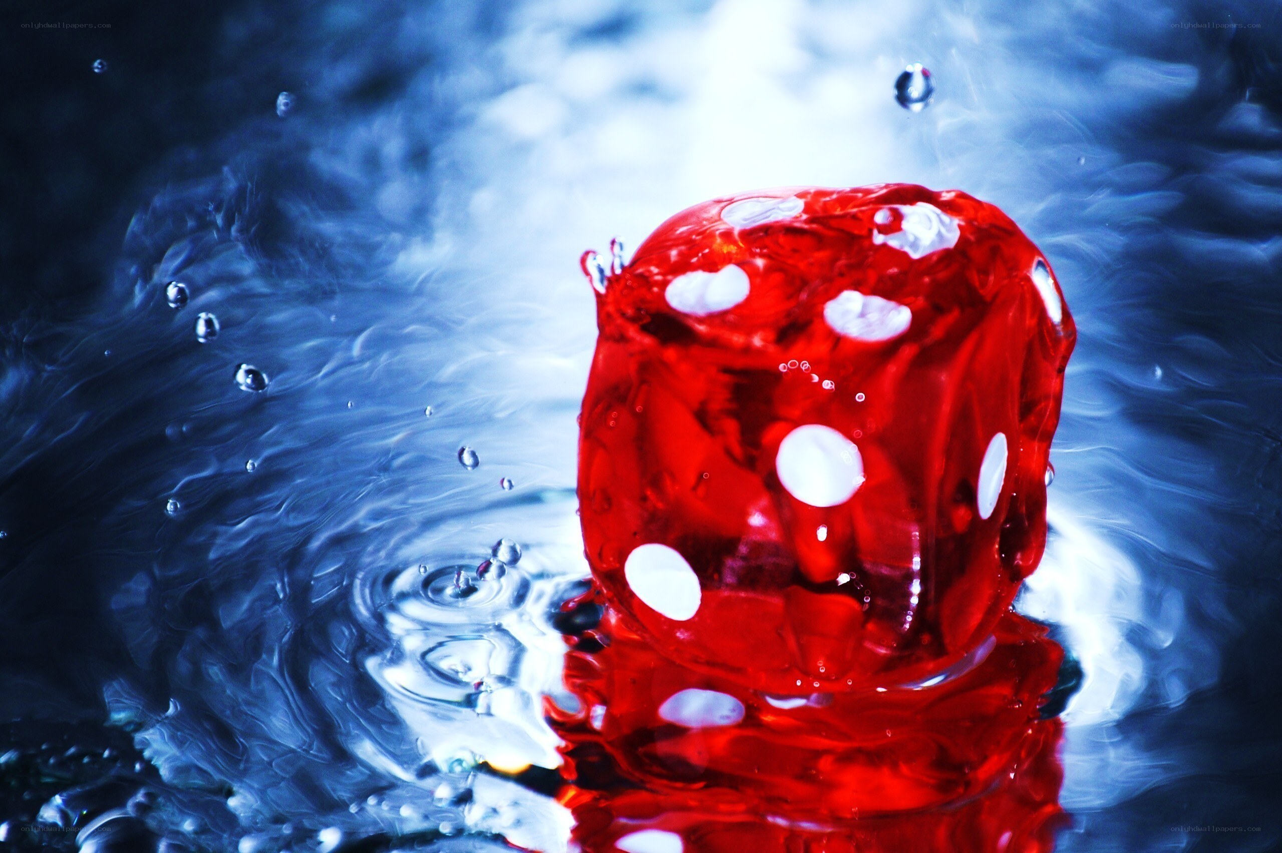Red die in water