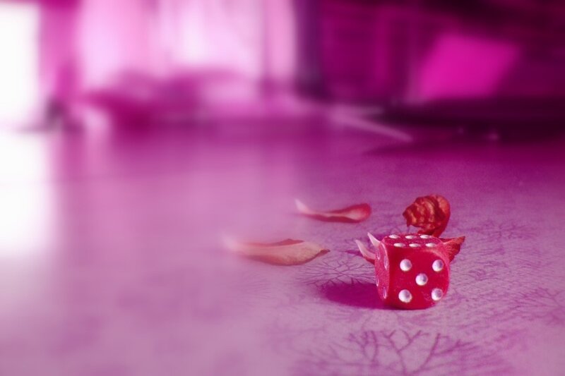 Red Die on Table