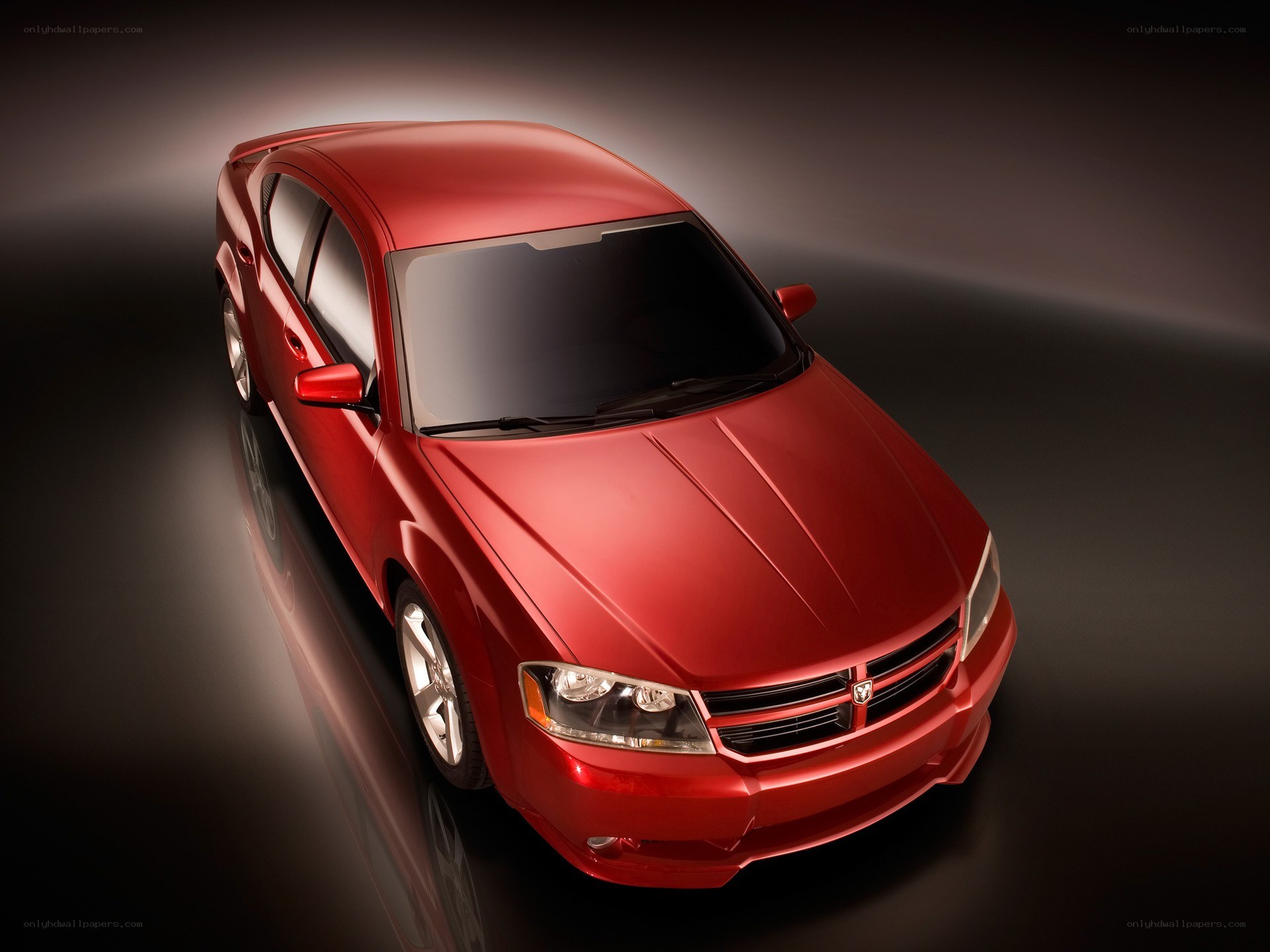 Red Dodge Avenger sedan