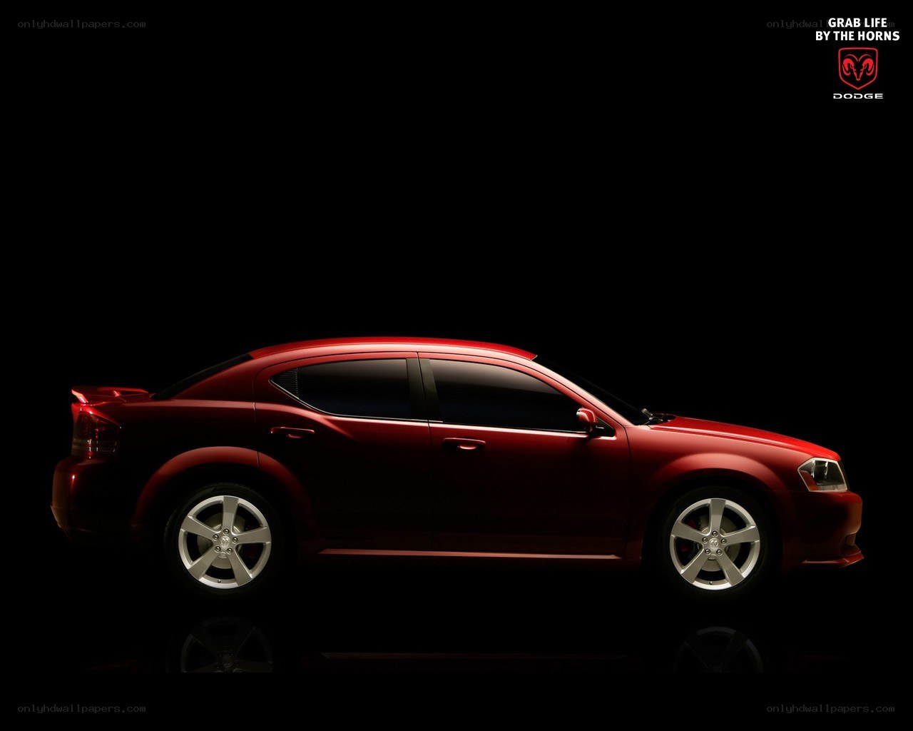 Red Dodge Avenger sedan