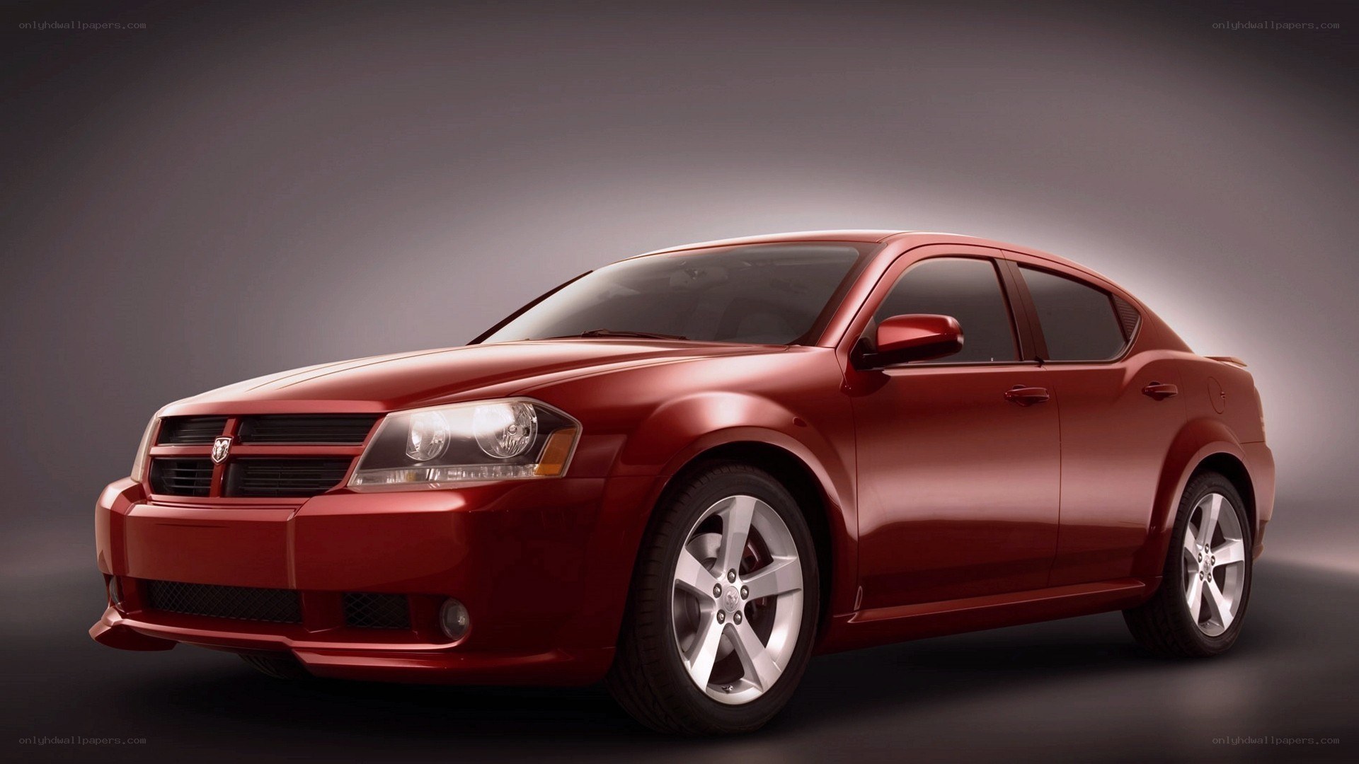 Red Dodge Avenger sedan