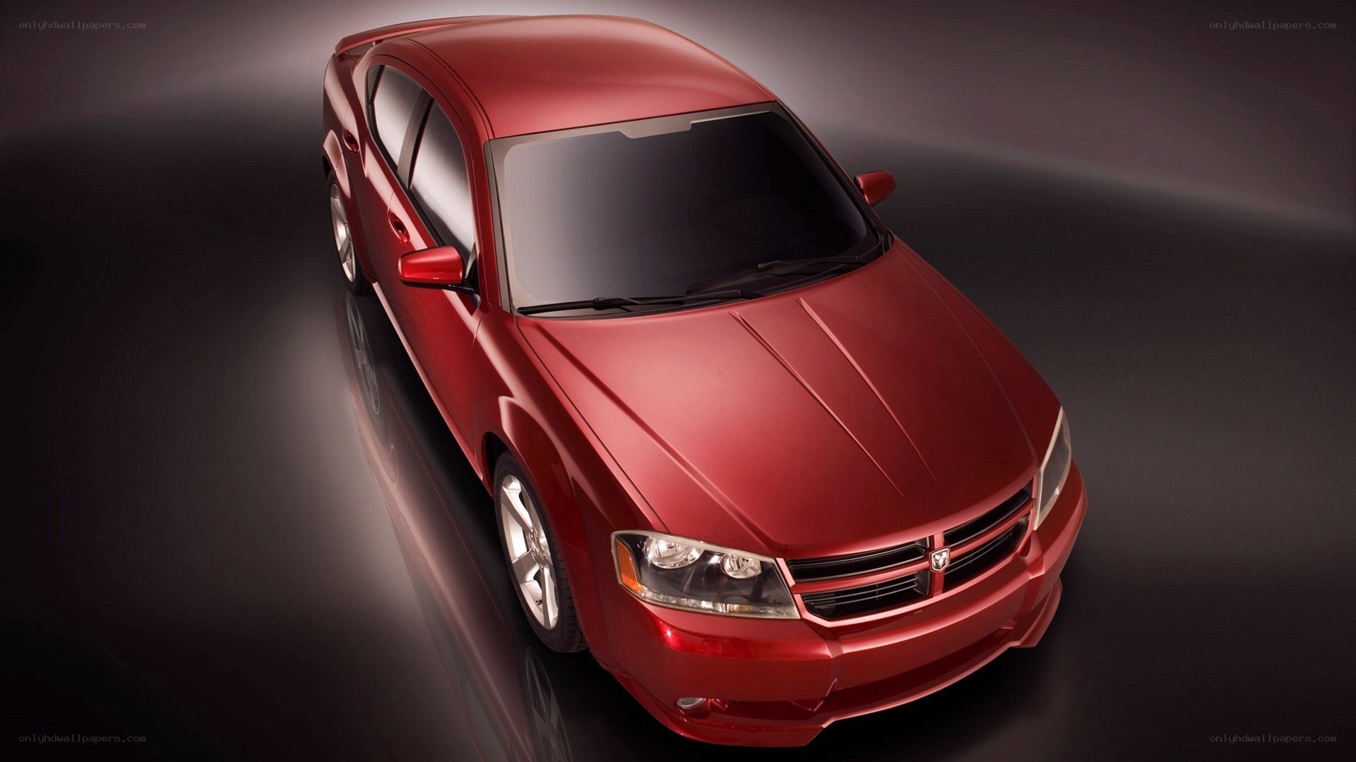 Red Dodge Avenger sedan