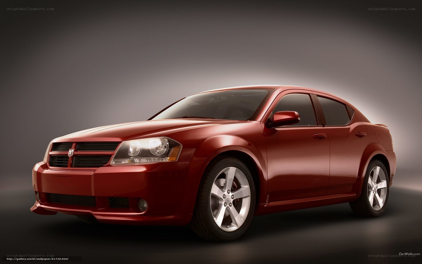 Red Dodge Avenger sedan