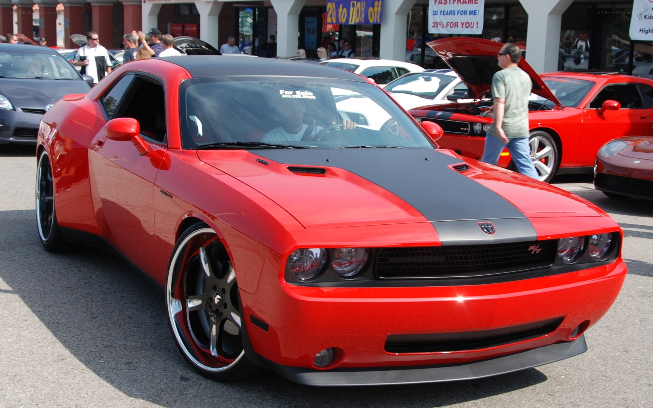 Red Dodge Challenger at car show
