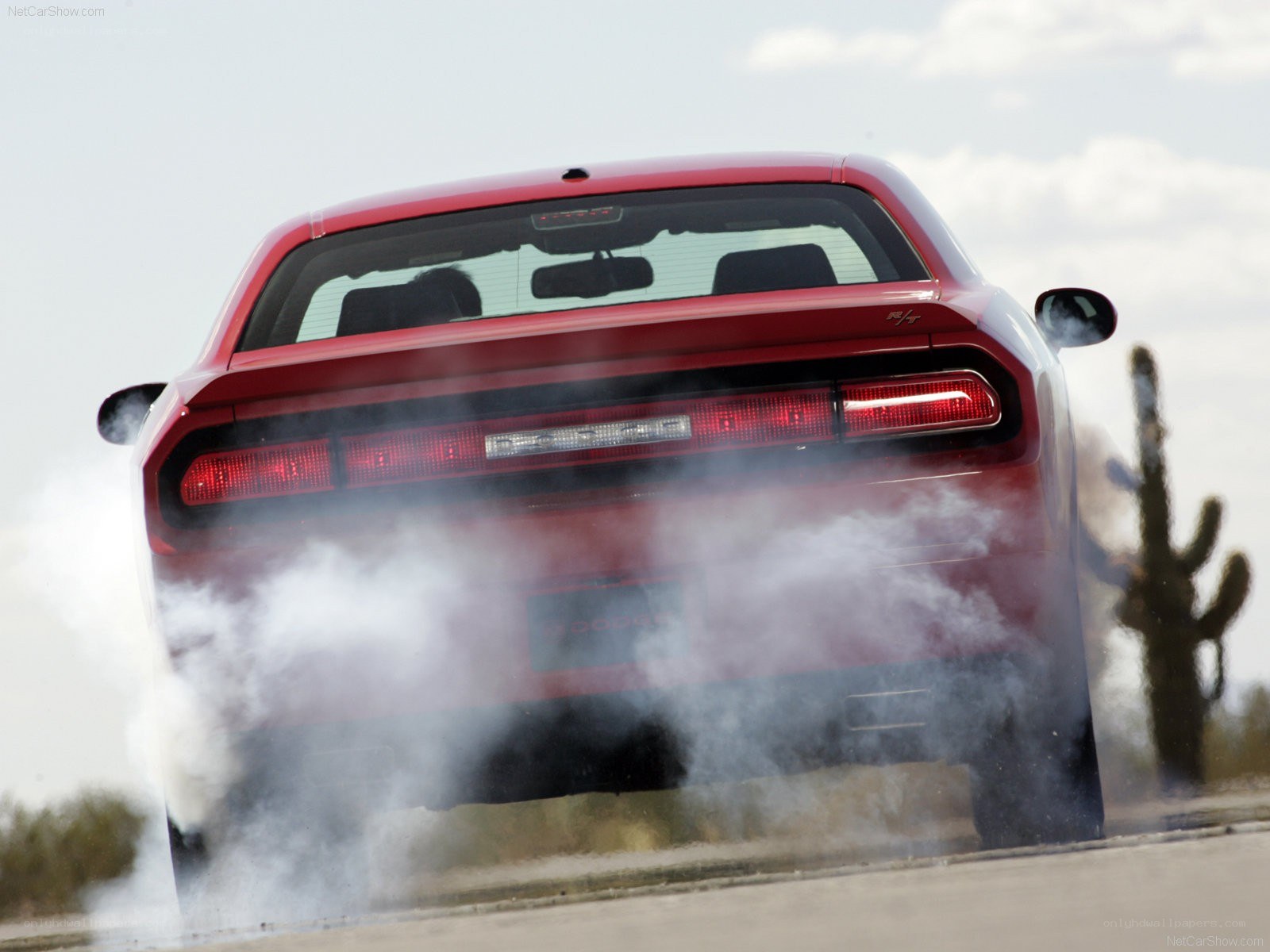 Red Dodge Challenger burnout