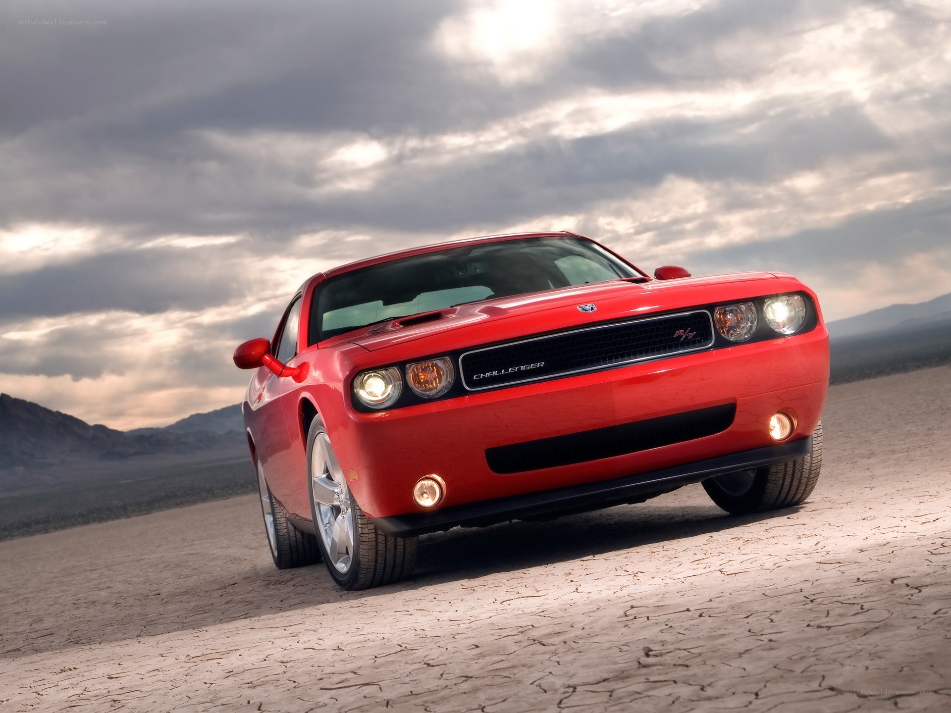 Red Dodge Challenger in desert