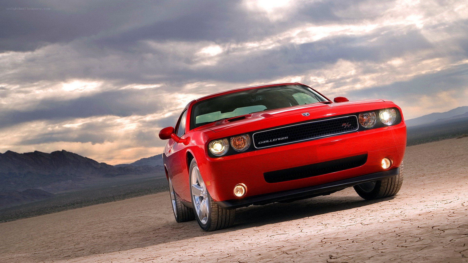 Red Dodge Challenger in desert