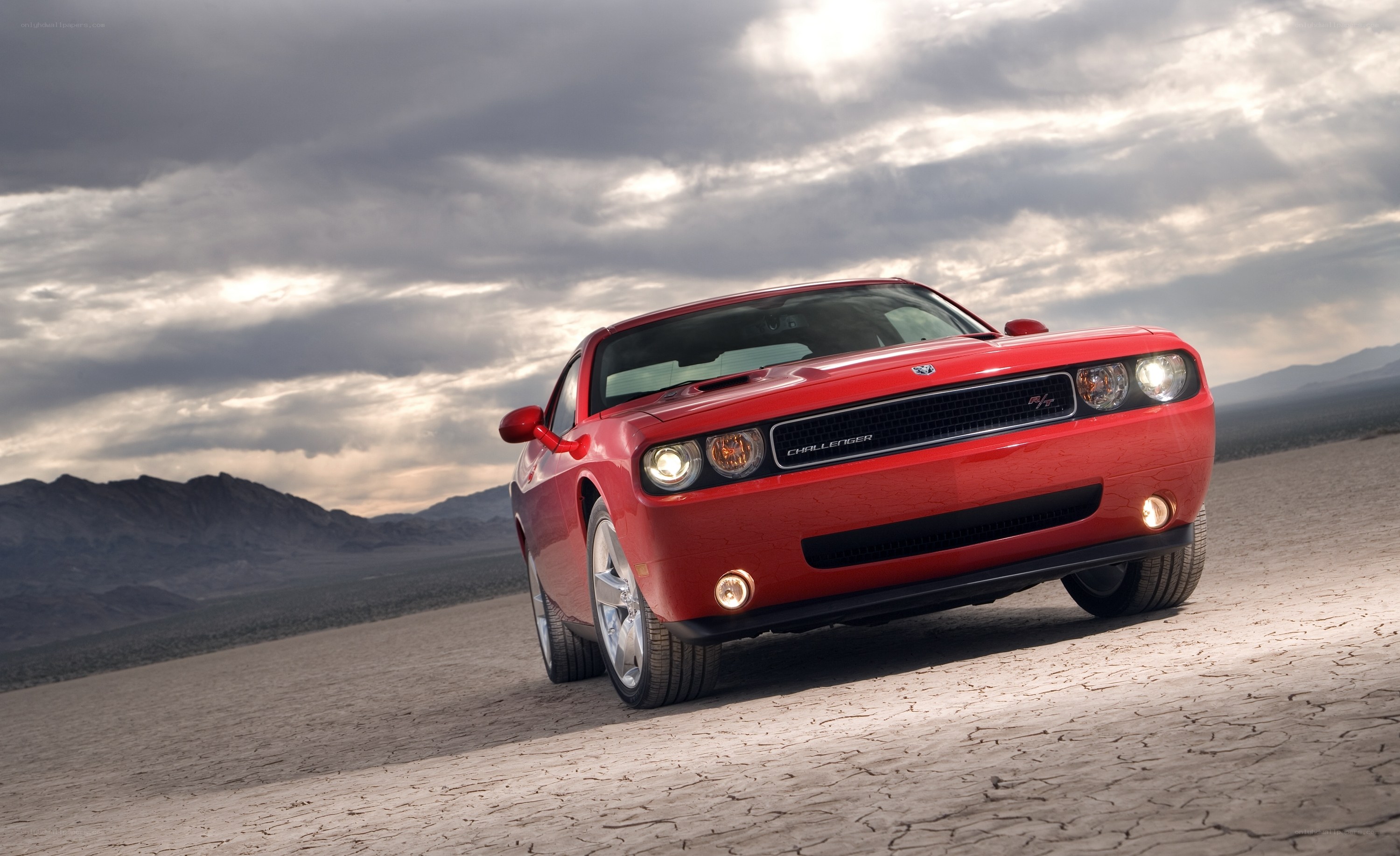 Red Dodge Challenger in desert