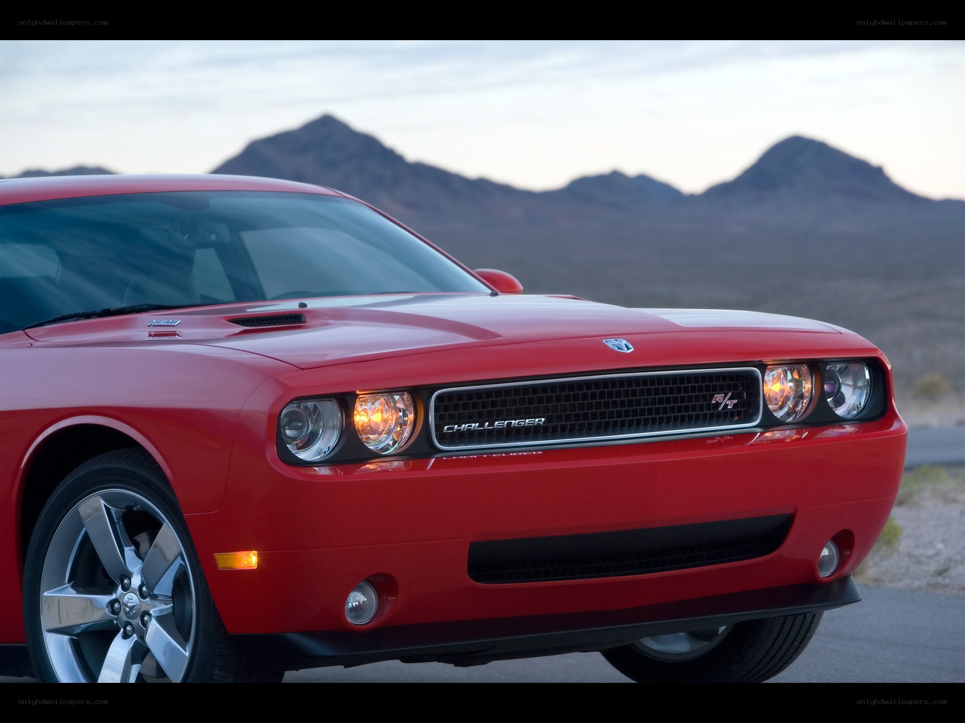 Red Dodge Challenger in desert