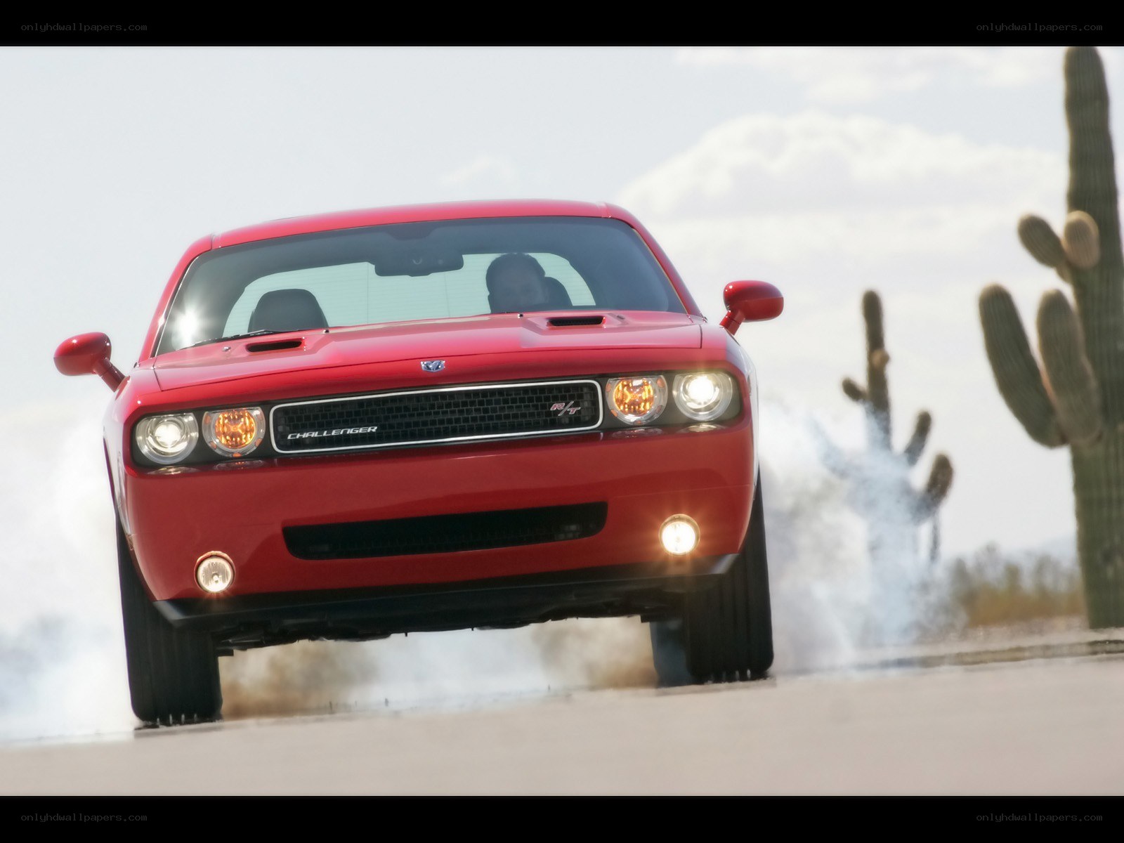 Red Dodge Challenger in desert
