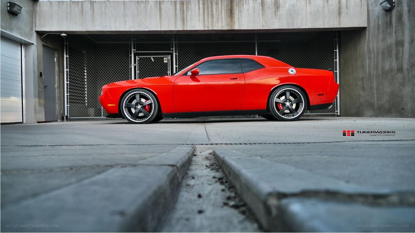 Red Dodge Challenger in garage