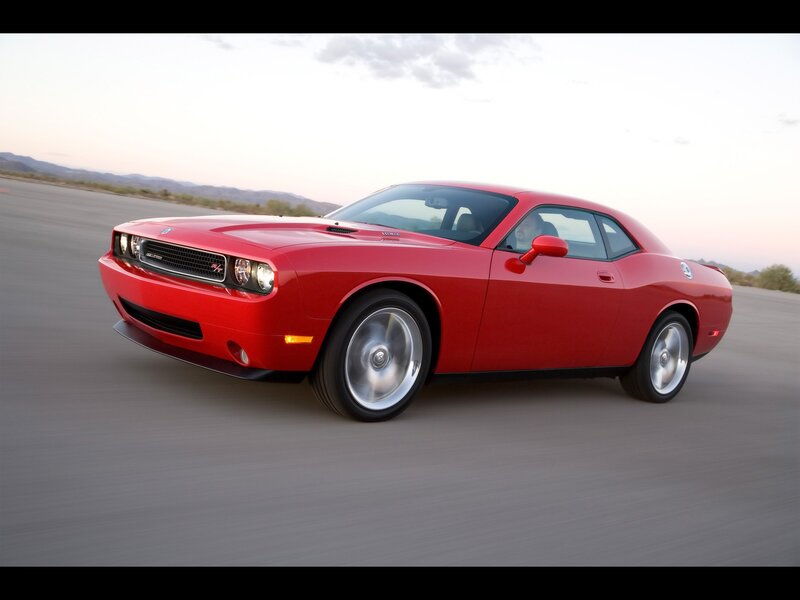 Red Dodge Challenger in motion