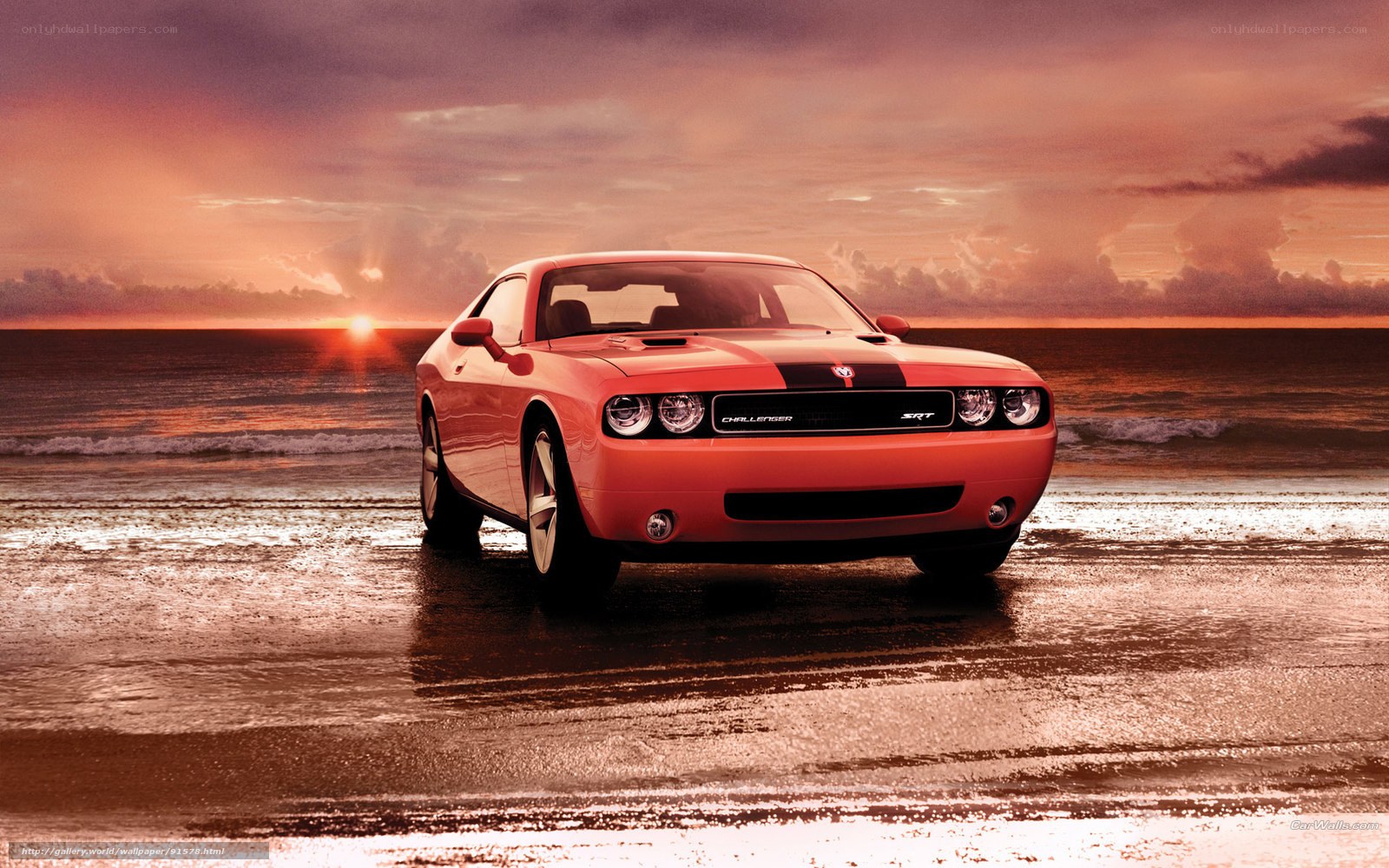 Red Dodge Challenger on beach